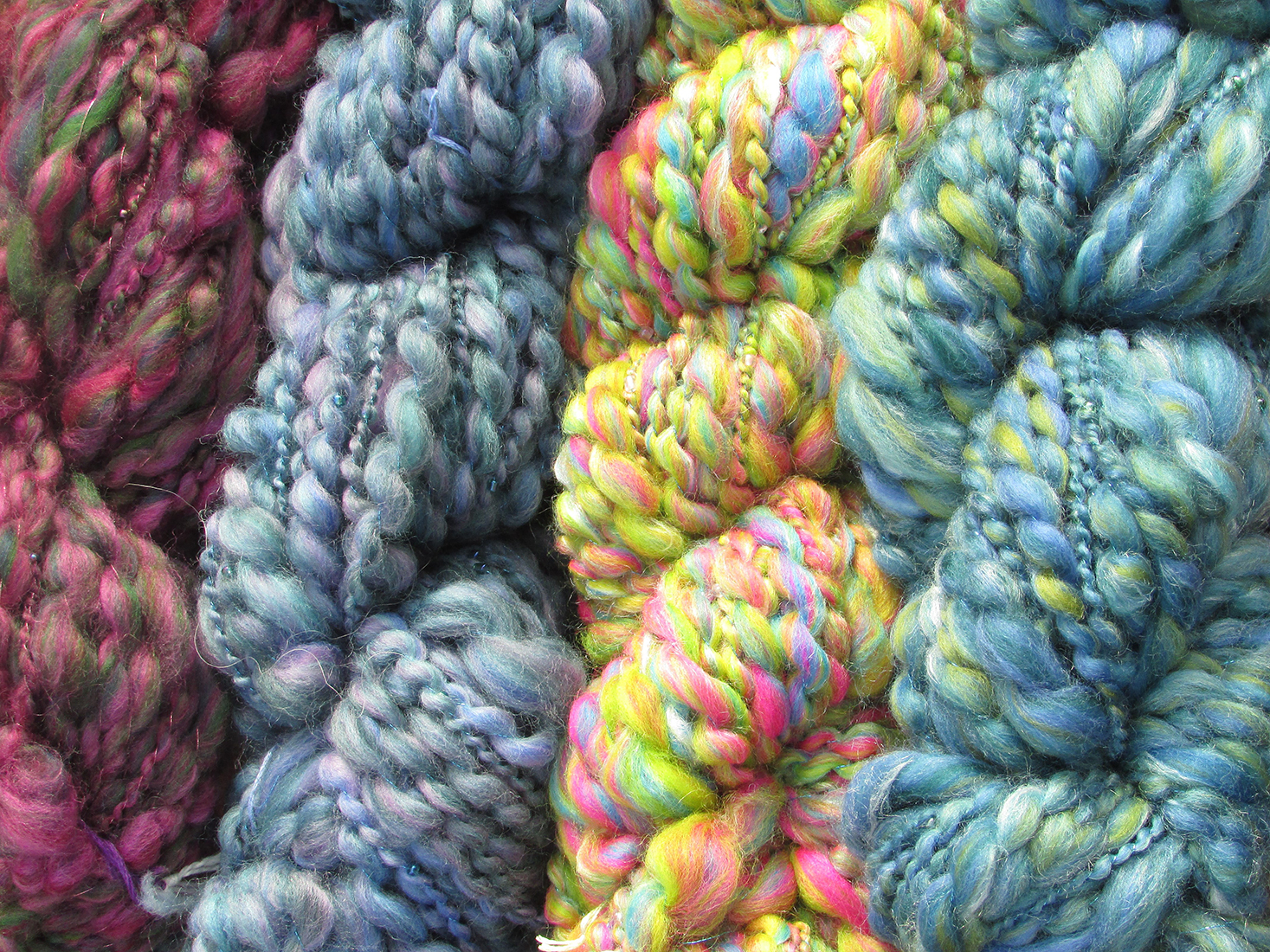 colourful skeins of hand spun yarn