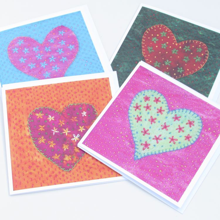 Four Heart and Flowers design greetings card in a range of vibrant colourways.