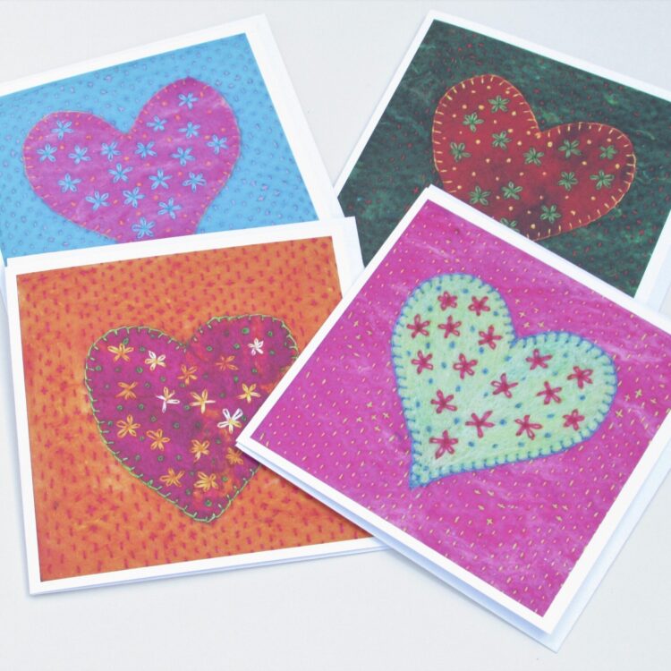 Four Heart and Flowers design greetings card in a range of vibrant colourways.