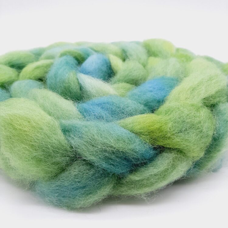 A braid of Cornish Romney roving hand dyed in beautiful shades of green.