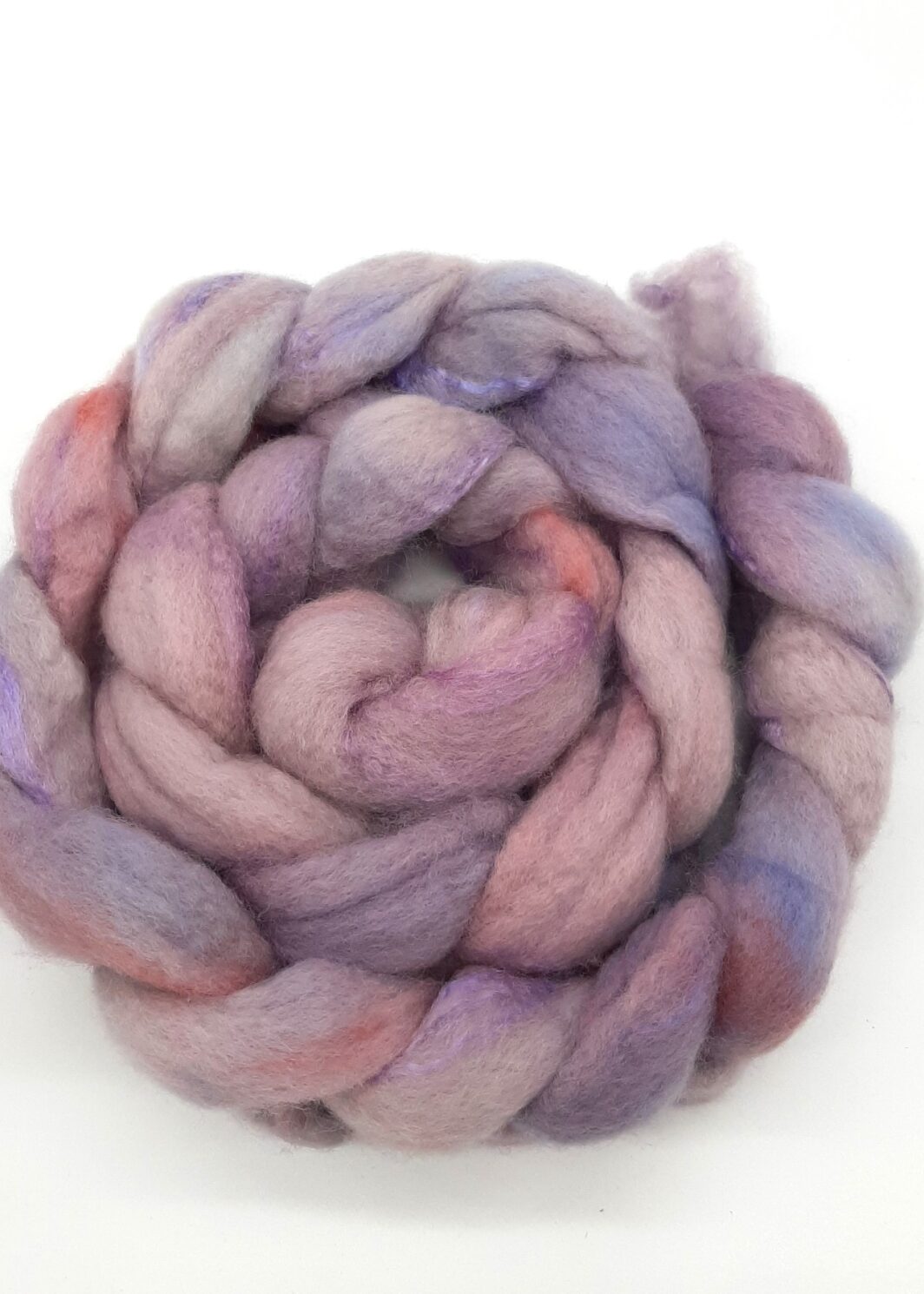 A braid of hand dyed Bluefaced Leicester and silk in shades of purple with a rosy blush