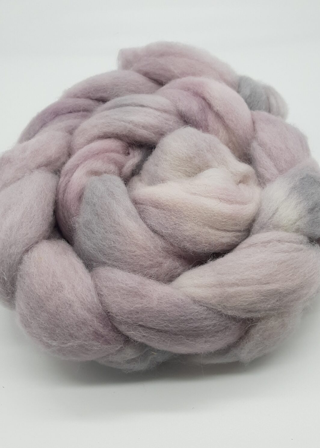 shetland fibre hand dyed in pale purples and greys, braided