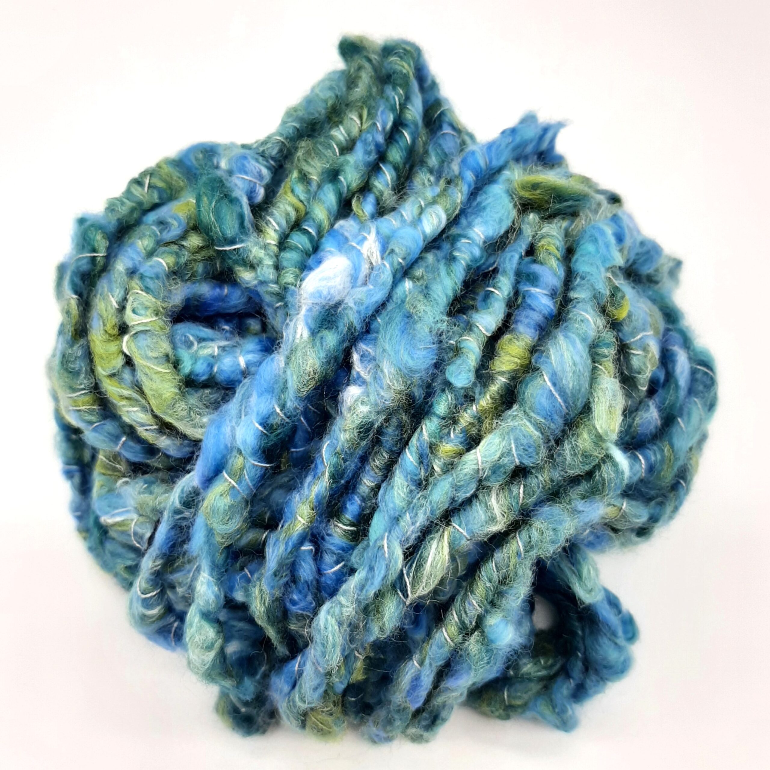 Polzeath Breeze handspun, corespun merino and silk yarn in blues and greens.