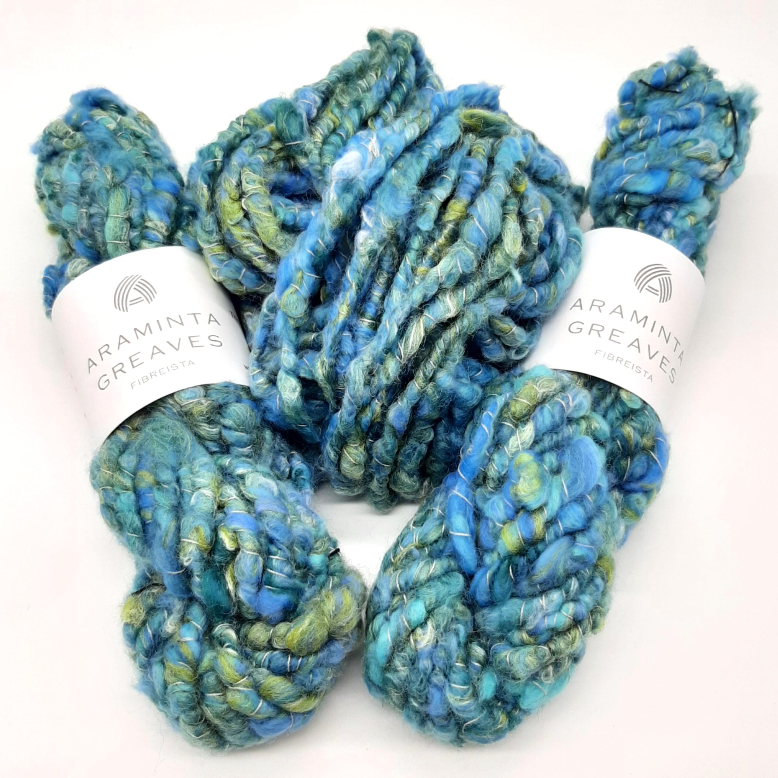 Polzeath Breeze handspun, corespun merino and silk yarn in blues and greens.