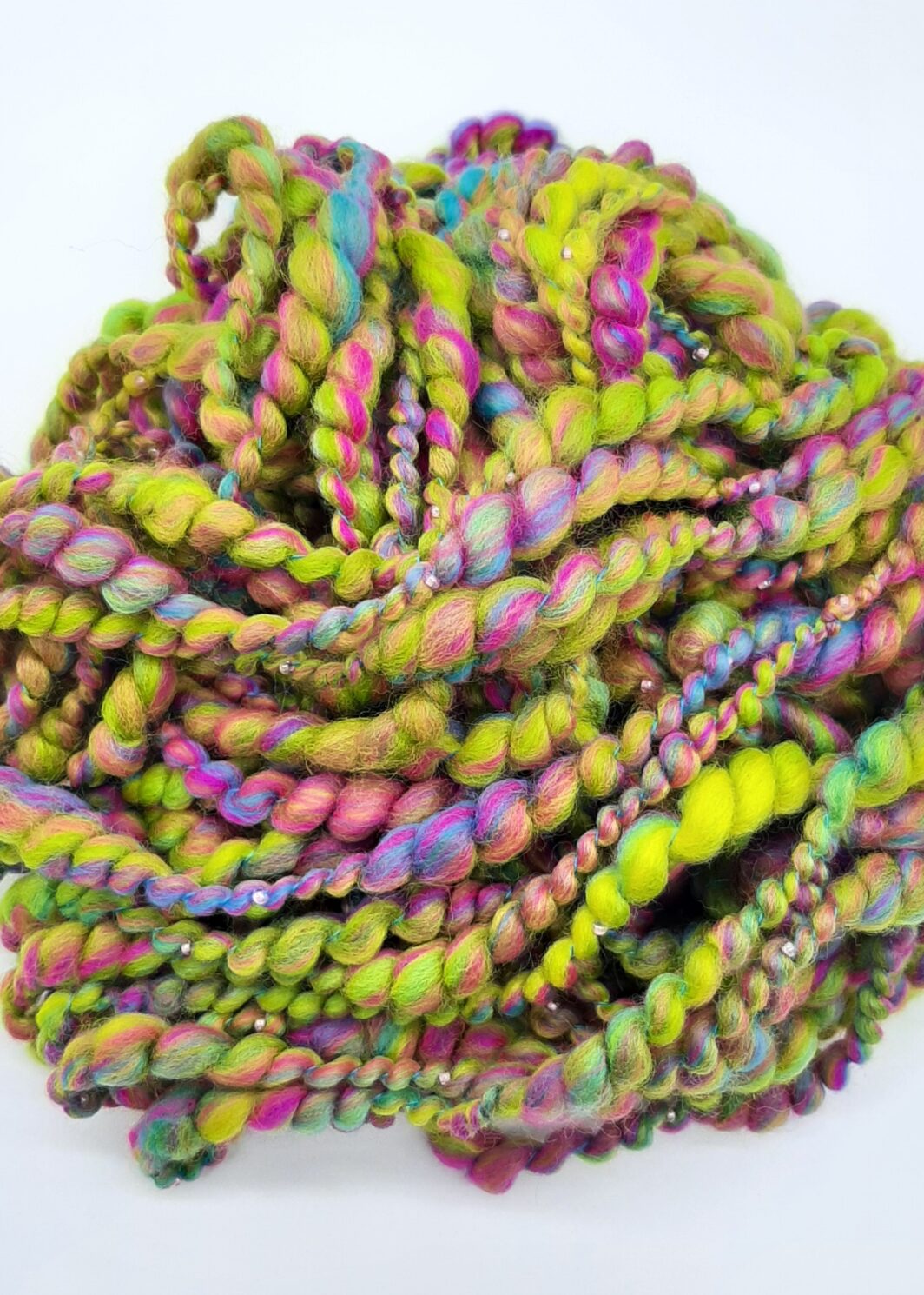 Summerleaze Beach Huts handspun beaded merino yarn in vibrant yellow, pink, green and blue.