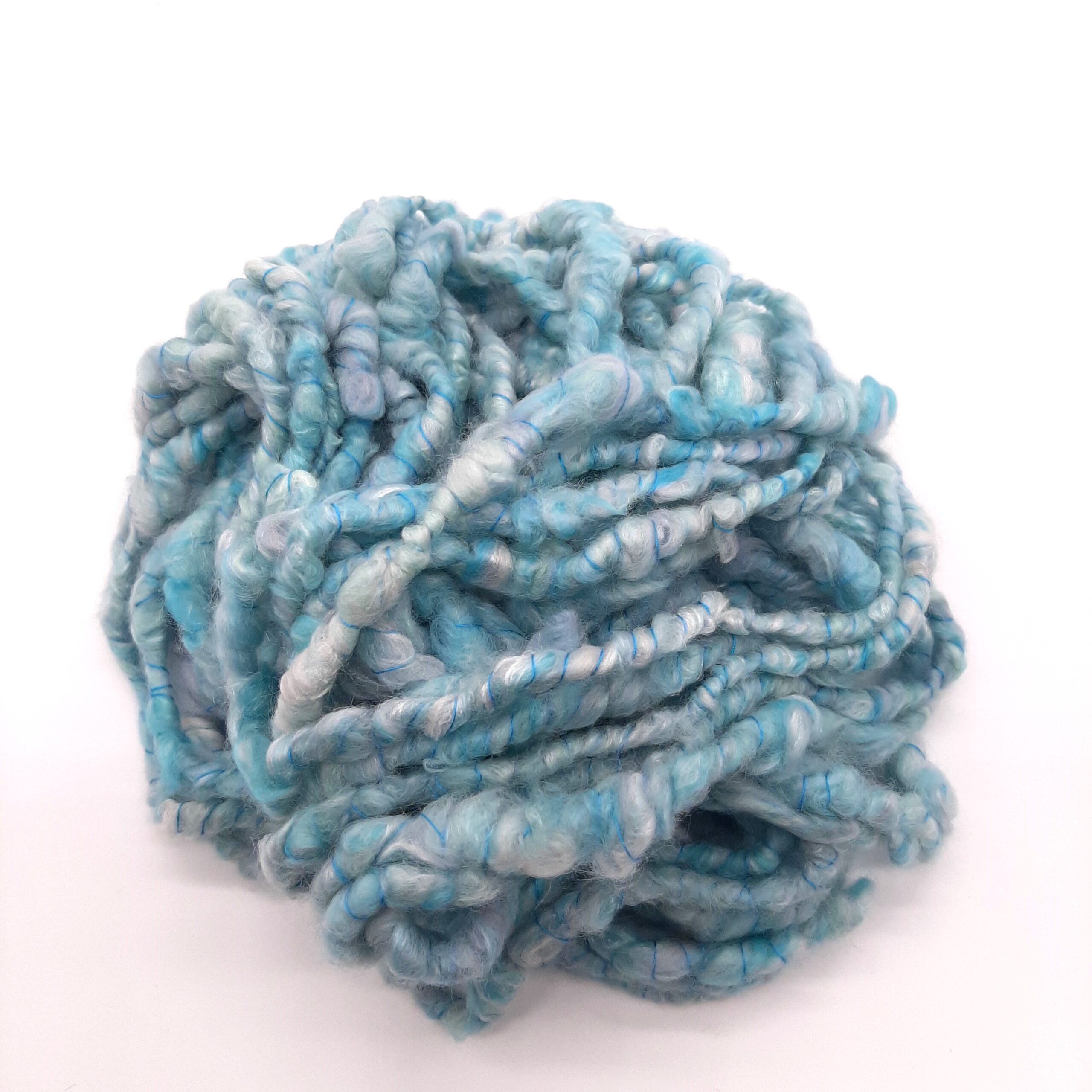 Trevone Foam, handspun corespun merion and silk yarn in pale blue, turquoise and grey.