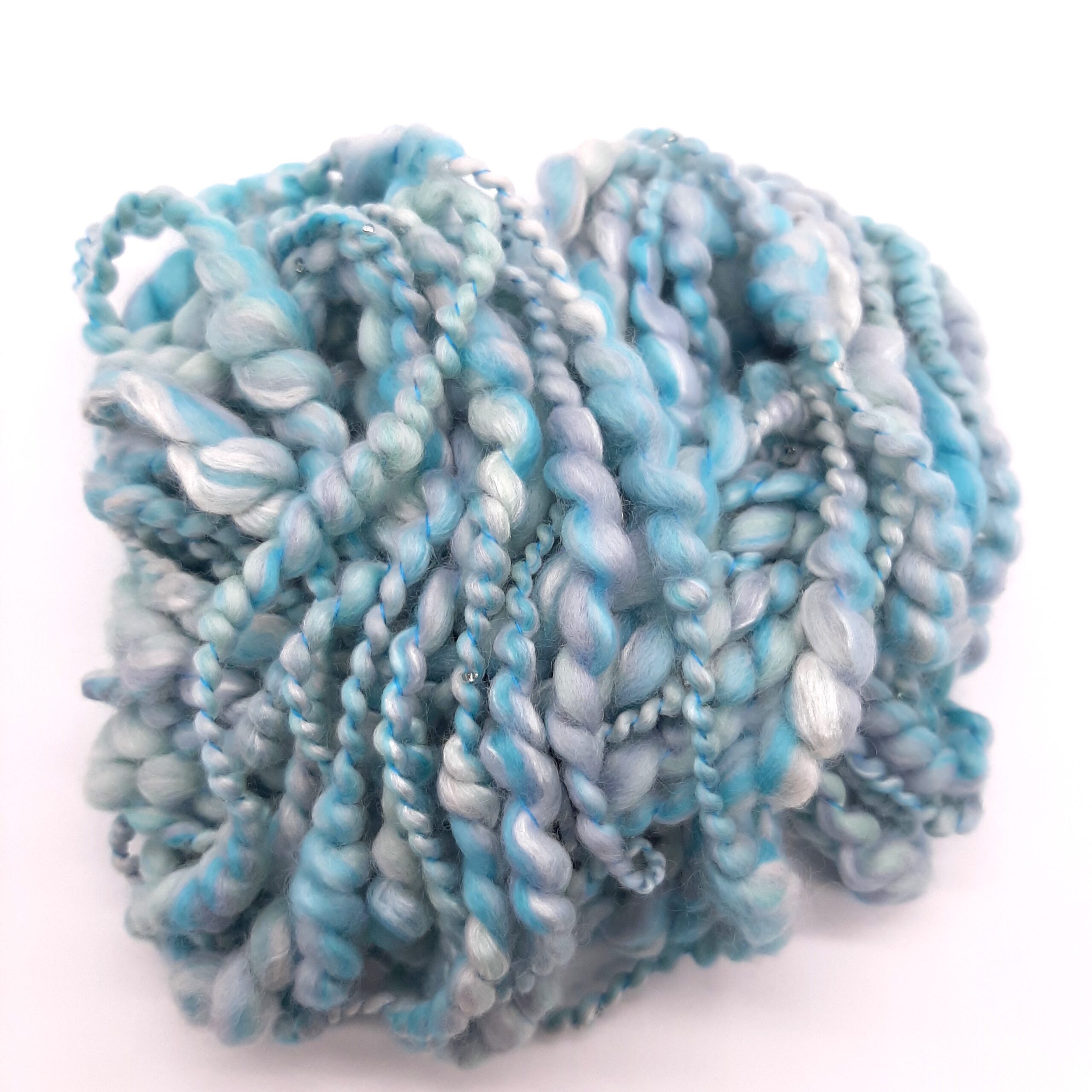 Trevone Foam, handspun beaded merino and silk yarn in pale blue, turquoise and grey.