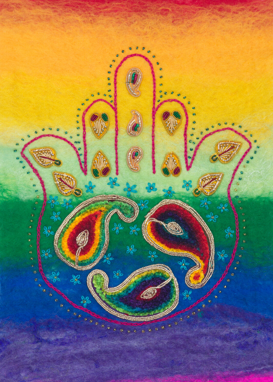 rainbow felt background with a Hamsa stitched in deep pink chain stitch with beaded embellishment